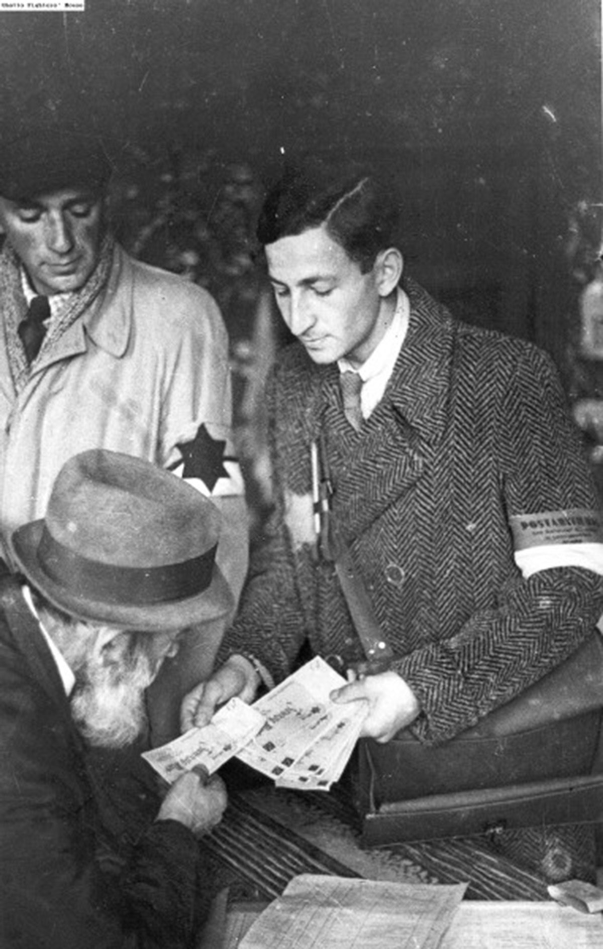 Nachman Zonabend delivering unemployment benefits 